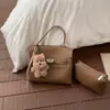 Bolsa de Jardim Patchwork em Lona Colorida Contrastante para Mulheres 2025 Nova Bolsa de Mão de Nicho Bolsa Tote de Primavera Super Popular Bolsa de Ombro Transversal
