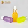 Botellas de Aceite Esencial Coloridas Más Vendidas por el Fabricante, Botellas Gotero para Líquidos de Esencia, Muestras de Empaque para Productos de Cuidado de la Piel, Botellas de Vidrio y Materiales de Empaque