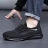 Zapatos casuales transfronterizos para hombre 2025 TEMU pegatinas de generación tejido fly transpirable zapatos de comercio exterior para hombre al por mayor zapatos de suela blanda de caña baja para hombre