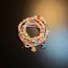 Pulseira multicamadas boêmia vintage com contas de estrela-do-mar e conchas, com um design único, acessório de pulseira estilo férias na ilha de nicho