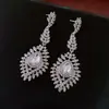 Pendientes de Borla con Lazo Incrustado de Diamantes Aguja de Plata Lujo Accesible Pendientes de Gama Alta Pendientes de Diseño de Nicho Europeo y Americano Venta al por Mayor para Mujeres