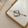 Nueva bloguera súper atractiva con horquilla geométrica simple de metal que combina con todo, plancha para el cabello con clip superior de estilo viento frío de Corea