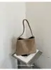 Nova bolsa feminina de comércio exterior, bolsa de balde retrô estilo coreano de grande capacidade para o dia a dia, bolsa de ombro de nicho elegante e versátil, bolsa de ombro da moda.