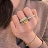Anillo de plata de ley S925 con incrustaciones densas de diamantes en forma de ojo de caballo y diamante amarillo de la suerte, anillo femenino estilo francés de lujo ligero de mediados de la era antigua, grano de arroz de alta calidad