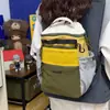 Nueva Mochila Exterior Transfronteriza de Alto Valor para Exteriores Color Bloqueo Pareja Gran Capacidad Mochila Escolar Atmósfera de Viaje Diario Doble Correa en Hombros