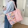 Bolsa de Lona Original de Dibujos Animados para Mujer 2025 Nueva Bolsa de Hombro de Gran Capacidad Bolsa para Estudiantes Tutorías Bolsa Tote de Nicho para Viajes