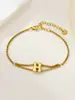 Nuevo Anillo de Acero Inoxidable al por Mayor Transfronterizo 26 Letras Inglesas Anillo de Doble Capa Pulsera Chapada en Oro