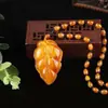 Collar de cadena para suéter con colgante de cera de abeja al por mayor resina alto sentido estilo nacional transmisión en vivo bienestar venderá joyas mujeres