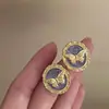 Pintura al óleo mariposa mariposa retro francesa esmalte de gota pendientes de metal lujo ligero sentido de alta calidad diseño de nicho temperamento de hada