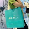 Bolsa de mão não tecida em estoque com LOGO estampado bolsa para roupas da moda bolsa para sapatos embalagem bolsa de presente bolsa com nome da loja estampado