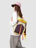 Bolsa de viaje de diseño nicho transfronteriza 2026 mochila de senderismo al aire libre con dopamina mochila de gran capacidad mochila de ciclismo para mujer