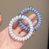 Goma para el pelo de alambre de teléfono con estampado de leopardo retro, alta elasticidad, banda de goma sin marcas para adultos, adecuada para coletas, simple y elegante, no daña el cabello