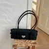 Bolso de axila de alta gama transfronterizo para mujer, nuevo modelo de moda versátil retro para el otoño de 2026, bolso de mano de lujo ligero