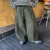 Pantalones para Niños Estilo Primavera/Otoño 2026 Pantalones Cargo de Retazos Desgastados para Niños Color Sólido Versátiles Ropa de Primavera para Bebé Niño Elegantes