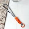 Correa de muñeca para teléfono móvil, pulsera corta para hombre y mujer, nuevo colgante personalizado, llavero de moda, cordón universal de 23 cm