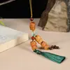 Colgante para Teléfono de Sándalo Tallado Cuatro Zorritos, Adorno Colgante para Coche con Borla Inspirada en el Zen