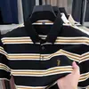 Camiseta de algodón con rayas teñidas en hilo y cuello de solapa para hombre, nueva de verano 2025, jacquard a rayas, casual, transpirable, polo para hombre