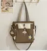 Mochila soft girl muito estilosa, mini bolsa mini ins, conjunto de mochila de duas peças para estudantes universitárias para passeios de primavera