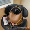 Bolso de mano de mujer de moda 2026 estilo coreano nuevo con patrón de lichi, gran capacidad, bolso de hombro, bolso cruzado tipo cubo