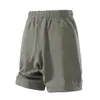 Verão 2026 Novos Shorts de Linho de Liocel Masculino Largos Modernos Versáteis Casuais Calças de Cinco Pontos Calças de Praia Algodão