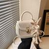 Bolso bandolera pequeño con textura de moda para mujer, primavera y verano 2024, nuevo bolso de hombro combinable, estilo occidental, bolso de sillín portátil