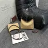 Bolso bandolera retro esmerilado de alta gama Monica Qiqi 2026 modelo nuevo bolso tipo dumpling de alta gama bolso de hombro de moda