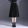 Saia estampada de bolinhas da moda para mulheres, novo estilo outono/inverno 2026, saia elegante e que afina em linha A, saia plissada moderna e que rejuvenesce