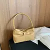 Bolso de mano con lazo de verano 2026 transfronterizo, bolso de hombro moderno y simple para el trabajo, bolso personalizado para el antebrazo