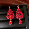 Pendientes elegantes europeos y americanos de lujo ligero con incrustaciones de diamantes de imitación, pendientes largos de cristal brillantes y lujosos, pendientes de moda para novia para mujer