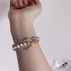 Ins versión coreana del tesoro azul del viento y el mar con la forma del brazalete de cristal doble anillo para mujer nicho pulsera de perlas de agua dulce joyería al por mayor