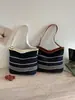 Bolso casual transfronterizo de gran capacidad para mujer, nuevo modelo 2026 bolso cruzado, bolso tipo cubo versátil para hombro para estudiantes universitarios y para ir al trabajo