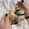 Llavero Dorado con un Diseño Similar al Modelo "Hazte Rico Ahora" de Oro Puro 999 de Shuibeike, Adecuado para Colgar en Teléfonos, Bolsas o como Colgante