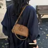 Bolsa transfronteriza para mujer, japonesa, coreana, mini, pequeña, con clip, para dama, nuevo estilo 2026, moda, doctor, de un solo hombro, para teléfono móvil, bolsa tb