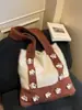 Otoño e Invierno 2025 Nuevo Estilo Coreano Bolso de Punto de Moda Sencillo Diseño de Nicho Bolso de Hombro Bolso Tote con Flores Coloridas