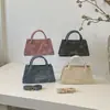 2026 principios de otoño textura vintage simple y elegante bolso cruzado casual bolso cuadrado pequeño de Instagram bolso de mano de moda para el trabajo