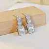 Pendientes de Zirconia Microincrustada con un Toque de Lujo Ligero y de Gama Alta, Adecuados para Ventas en Vivo de Comercio Exterior, Wholesale Exagerado, Regalo del Festival Qixi E048