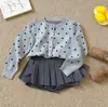 Suéter Superior de Punto para Niña Otoño/Invierno 2026 Cárdigan de Punto con Lunares Franceses Vintage Abrigo Elegante Versátil para Niñas Pequeñas