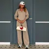 Conjunto Novo de Moletom e Calça Outono Europeu e Americano Feminino Duas Peças Pulôver com Meio Zíper e Decote em V Manga Longa Calça Longa Casual de Pernas Largas