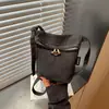 Bolso bandolera tipo cubo de mezclilla de moda estilo coreano transfronterizo 2026 nuevo de verano ligero para teléfono móvil bolso de hombro casual