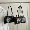 Bolsa de mão retrô nova, estilosa e casual, design minimalista, bolsa de ombro, tendência de verão 2026, bolsa de axila feminina única