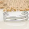 Pulsera de acero de titanio de lujo ligero de doble capa lisa en dos tonos dorado y plateado estilo INS de Europa y Estados Unidos, moda transfronteriza que combina con todo, pulsera de acero inoxidable
