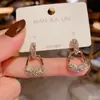 Aguja de Plata 925 Suministro de Puesto de Mercado Nocturno Pendientes Moda Femenina Asimétricos Populares Explosiones Japonesas y Coreanas Pendientes A