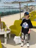 Tairu 2026 Nuevo Estilo de Verano Versión Coreana Camiseta Transpirable de Algodón Puro Estampada en Mezclilla para Niños, Top Versátil de Manga Corta para Niños