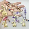 Bolsa Colgante de Personaje de Anime Estrella de Oro Puro Dos en Uno Colgante para Teléfono Móvil Regalo Personalizado y Versátil para Amigos y Mejores Amigas