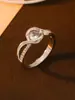 Europa y Estados Unidos anillo de brazo retorcido creativo transfronterizo ocho corazones ocho flechas anillo de diamante simple atmosférico joyería de alta gama al por mayor