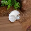 Anillo elástico con diseño de flor de concha blanca esmaltada mate transfronterizo, anillo geométrico floral simple de alta gama para mujer