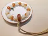 Pulsera de raíz de Bodhi de Jade Blanco garra de gato carbón pulsera de Bodhi cuentas de Buda refinadas de lanzamiento alto rosario Wenwan 12M Mayoreo
