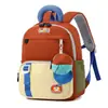 Temporada de Regreso a Clases Unisex Infantil Casual Descompresión Doble Hombro Alta Apariencia Nuevo Bloque de Color Simple Mochila Infantil para Jardín de Infancia Transfronterizo