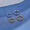 Europa y Estados Unidos explosiones comercio venta directa acero inoxidable 316L flor por lotes dos capas de anillo de nariz acero de titanio clavo de nariz joyería para perforación