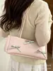 Bolsa Prata para Mulheres 2025 Nova Tendência Moda Bolsa de Ombro com Laço Grande Capacidade Versátil para o Dia a Dia Bolsa de Axila